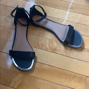Black flats, with adjustable ankle bands